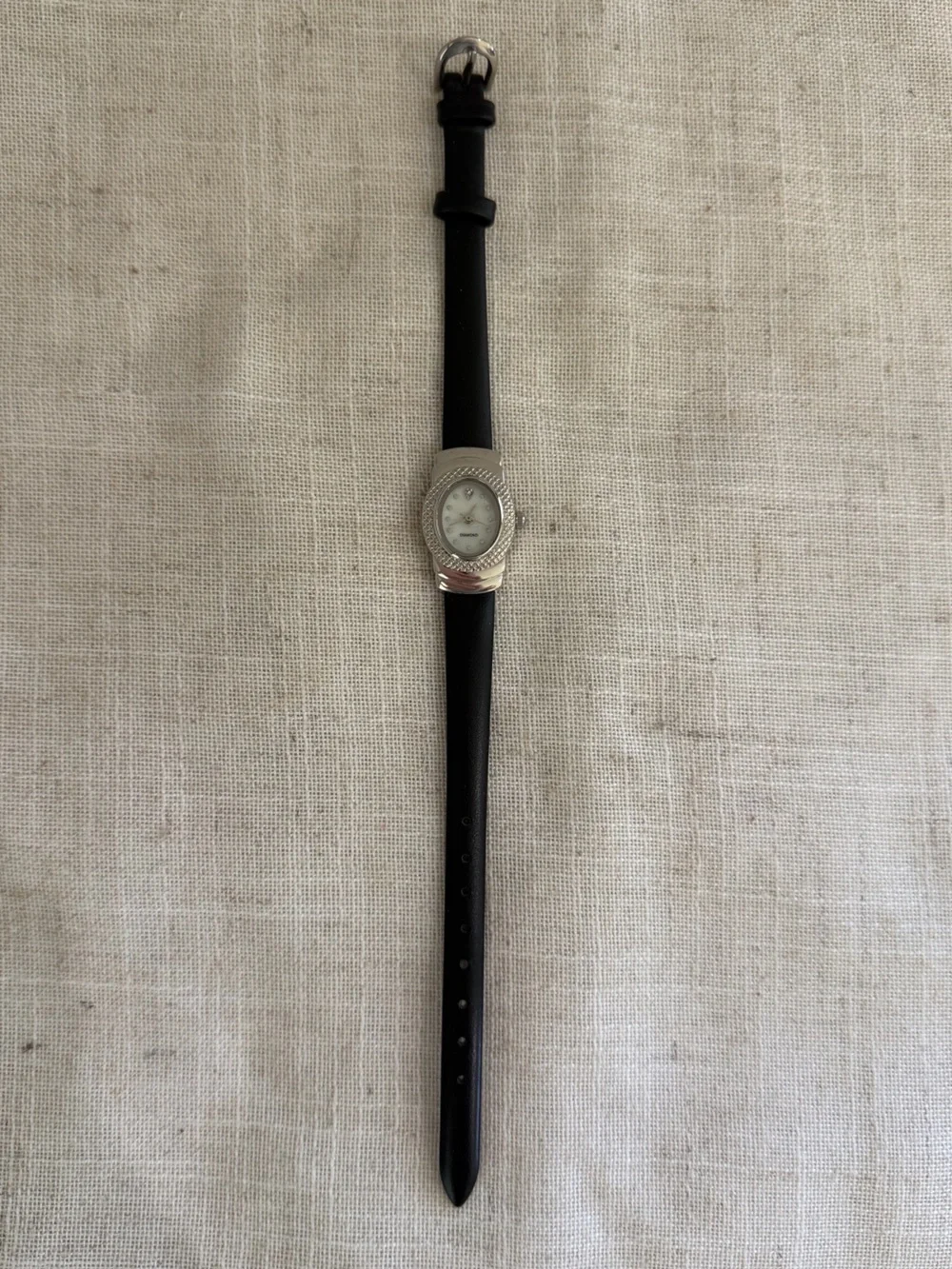 Diamond Accent Slim Black Leather Strap Watch with Silver Oval Face